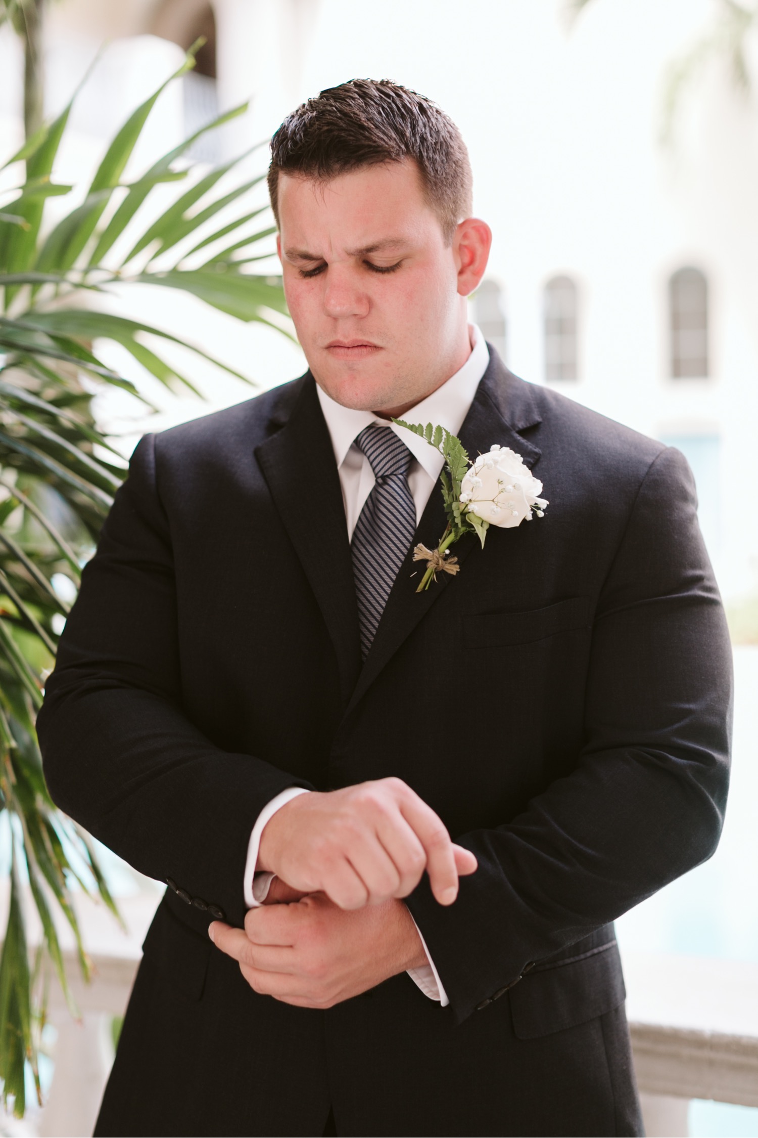 005_Brayden-Julianne-Wedding-62_at_Cafe_Julia_Hawaii_getting_Groom_ready.jpg
