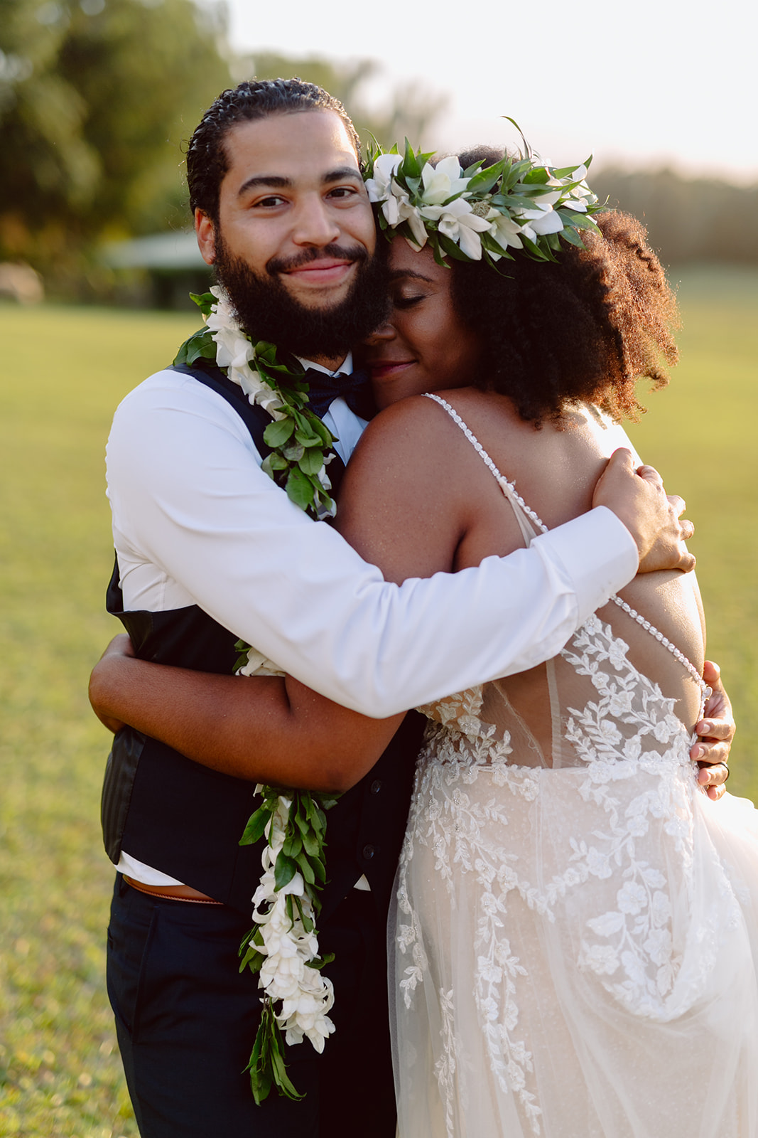 Couple hugging at susnet