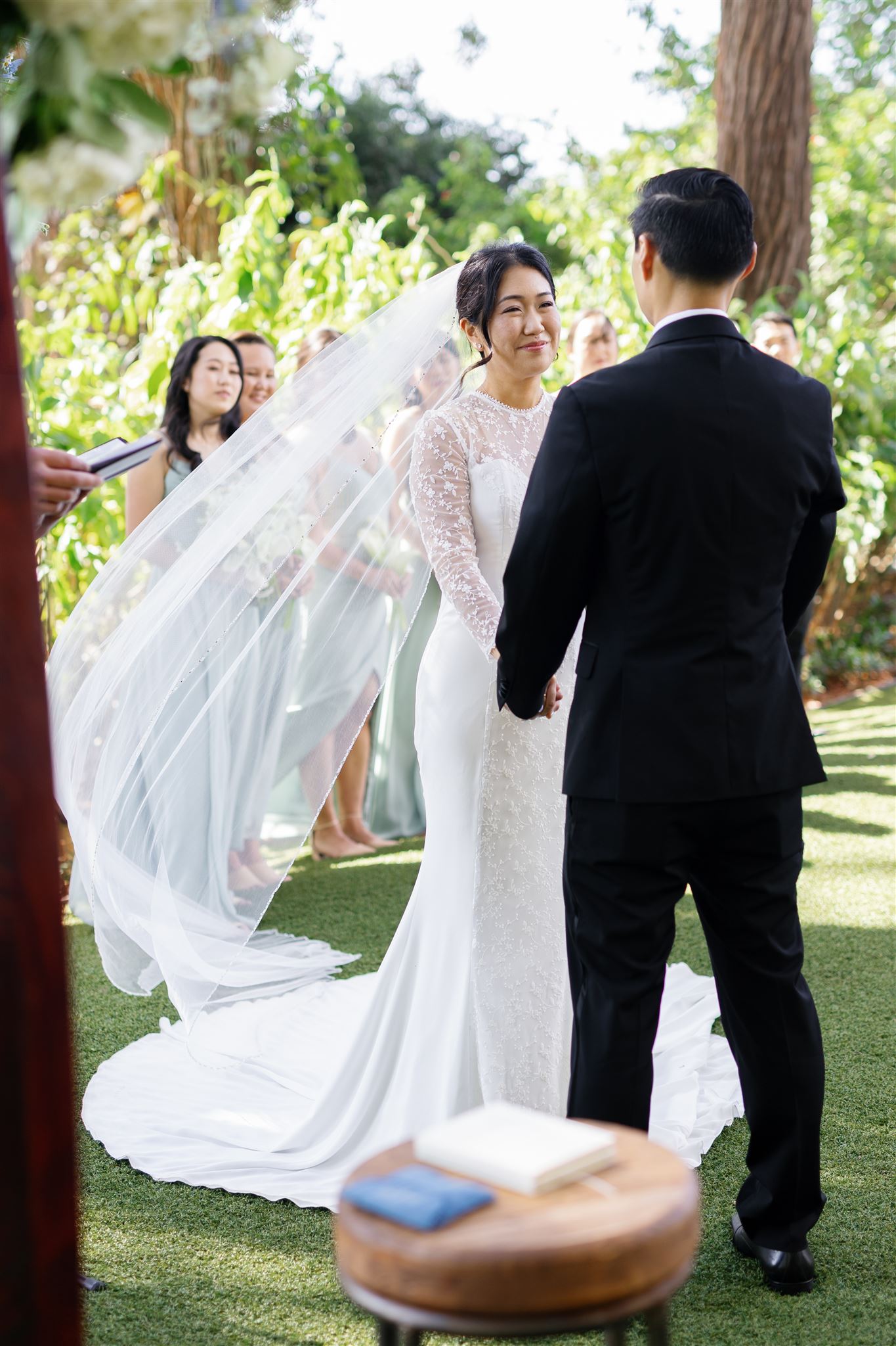 a couple having their wedding ceremony at sunset ranch