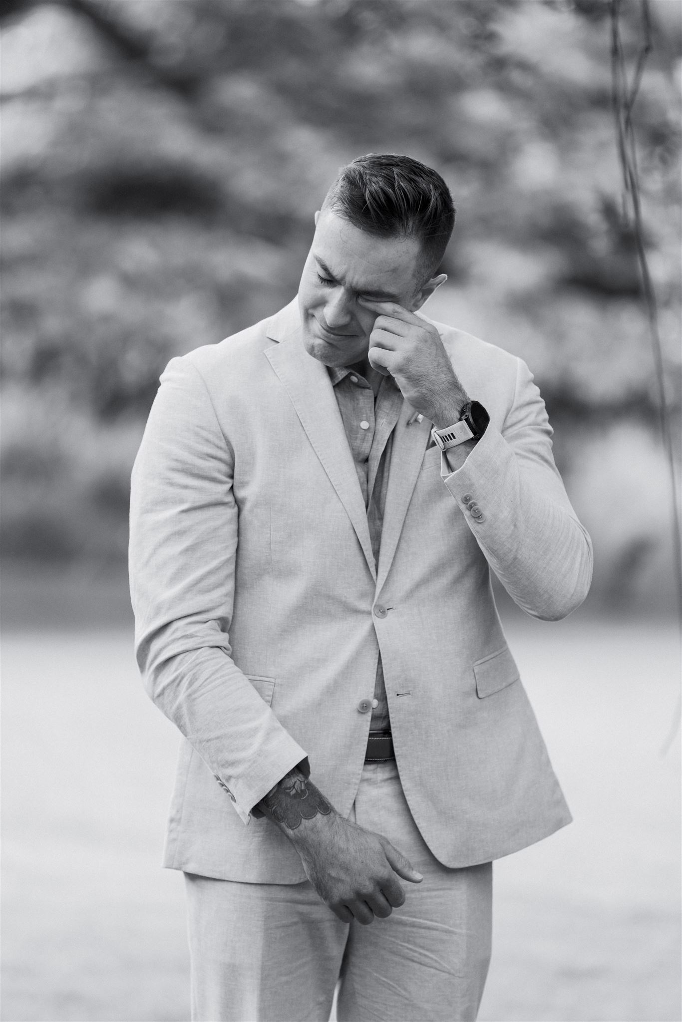 a groom getting emotional at his wedding ceremony